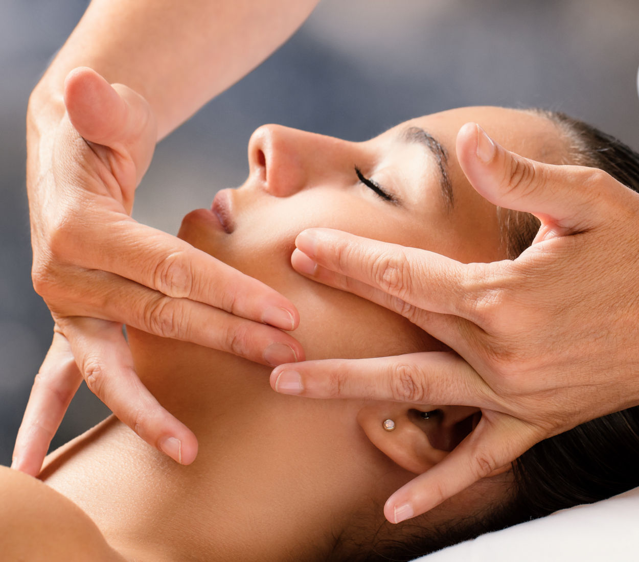 Revitalize your skin with exquisite face treatments in Santorini.