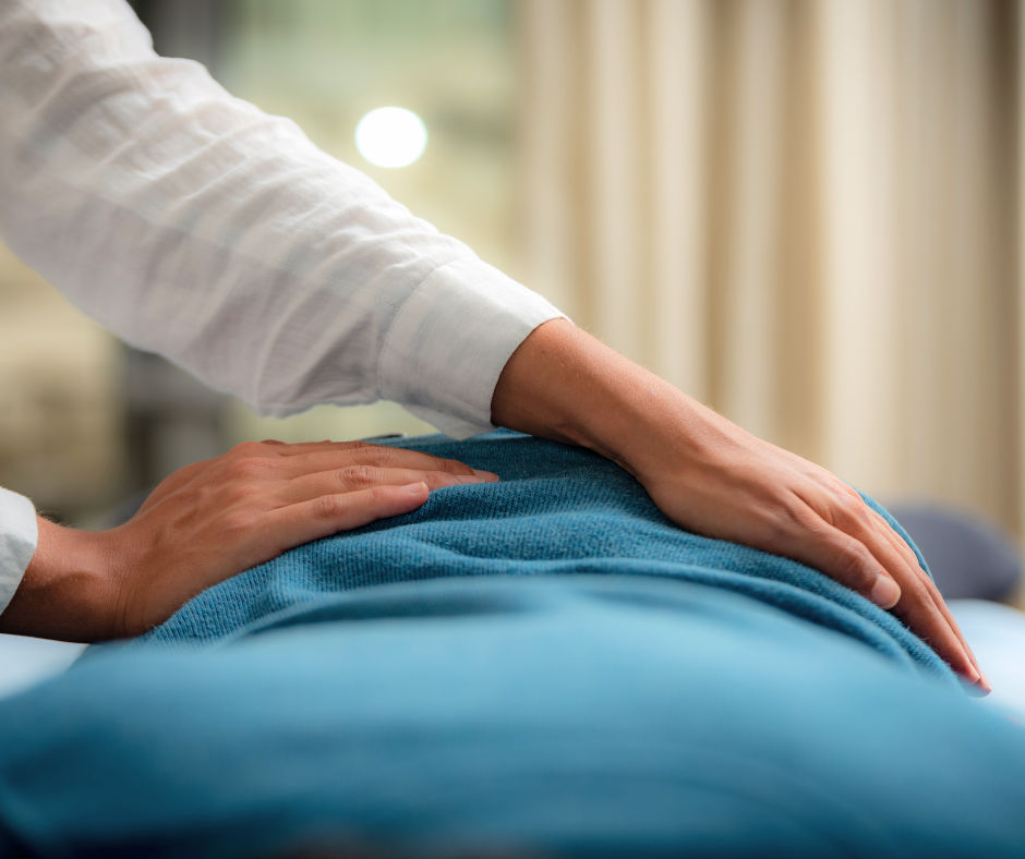 A serene moment captured during a Reiki Massage in Santorini, where the soothing touch harmonizes mind and body.