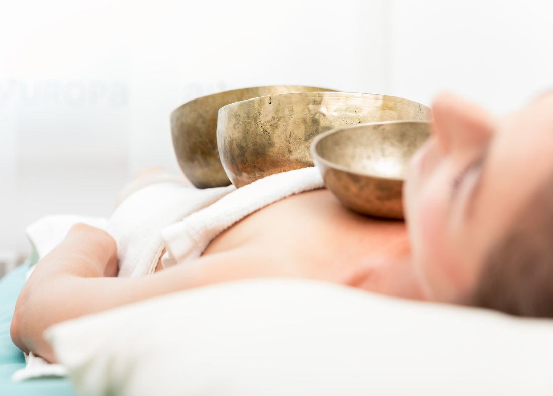 Experience Sound Healing in Santorini a transformative therapy using Tibetan singing bowls and sound healing forks for physical and emotional realignment.